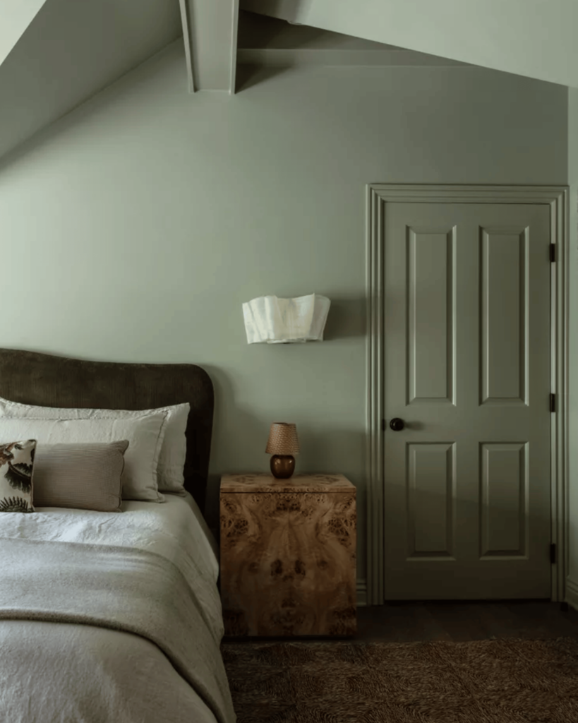 serene calming sage coloured bedroom design by Jake Arnold
