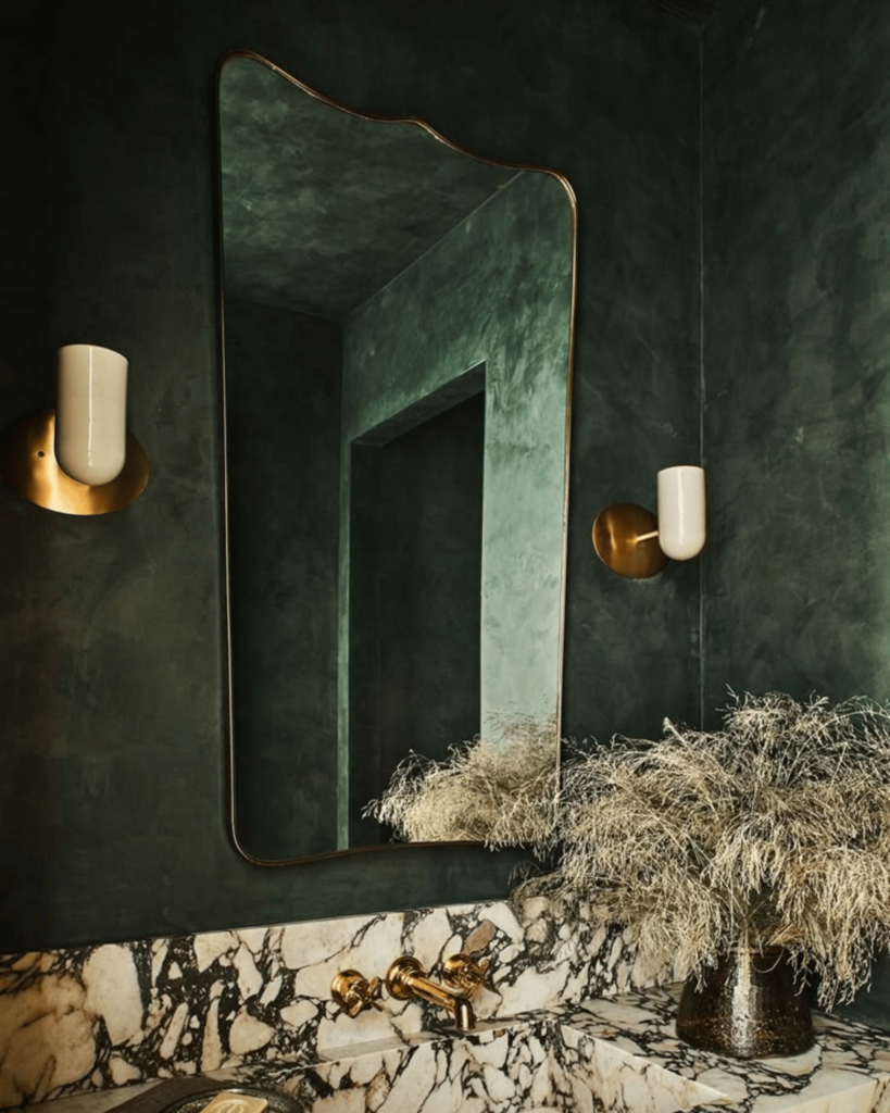 high impact green walls in a moody powder bath by Studio Life/Style