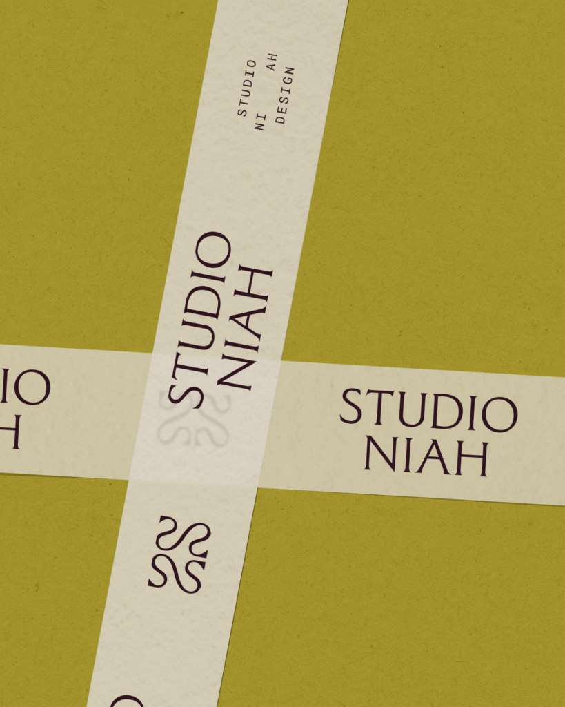 Branded packing tape design for Studio Niah featuring bold typography on a textured olive green background, illustrating a cohesive brand unboxing experience.